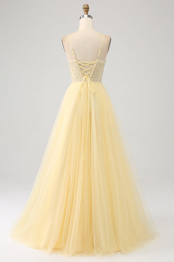 Tulle in rilievo giallo chiarovestito da ballo con spacco